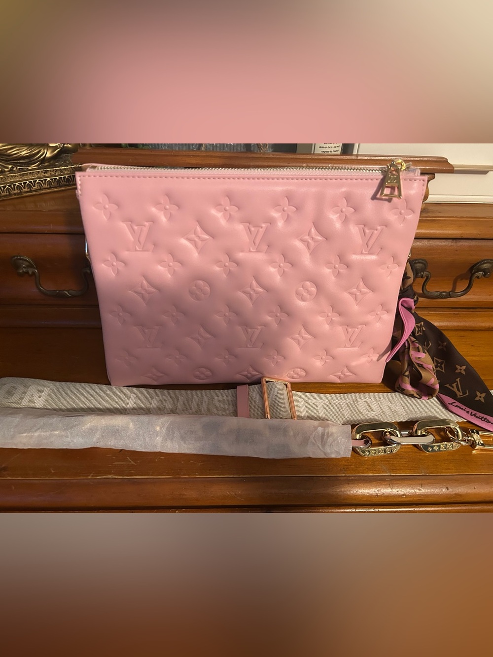Pink Logo Purse with Webbing Strap and a Gold Hardware strap